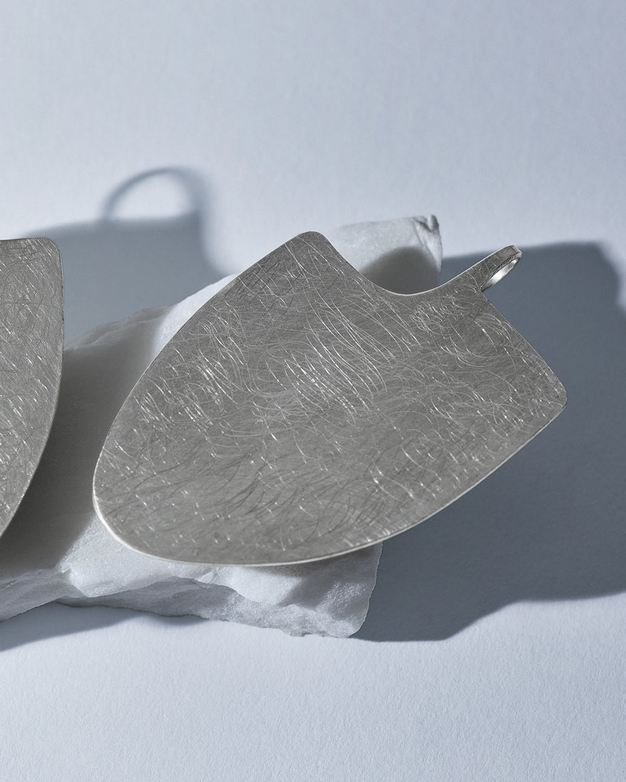 Hand-etched sterling silver earrings