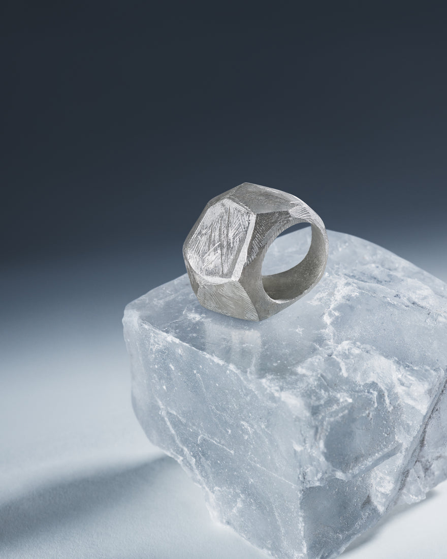 hand-finished silver ring with geometric design