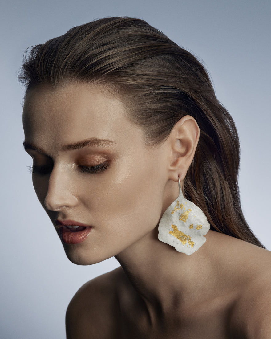 Large sterling silver and gold leaf-shaped earrings