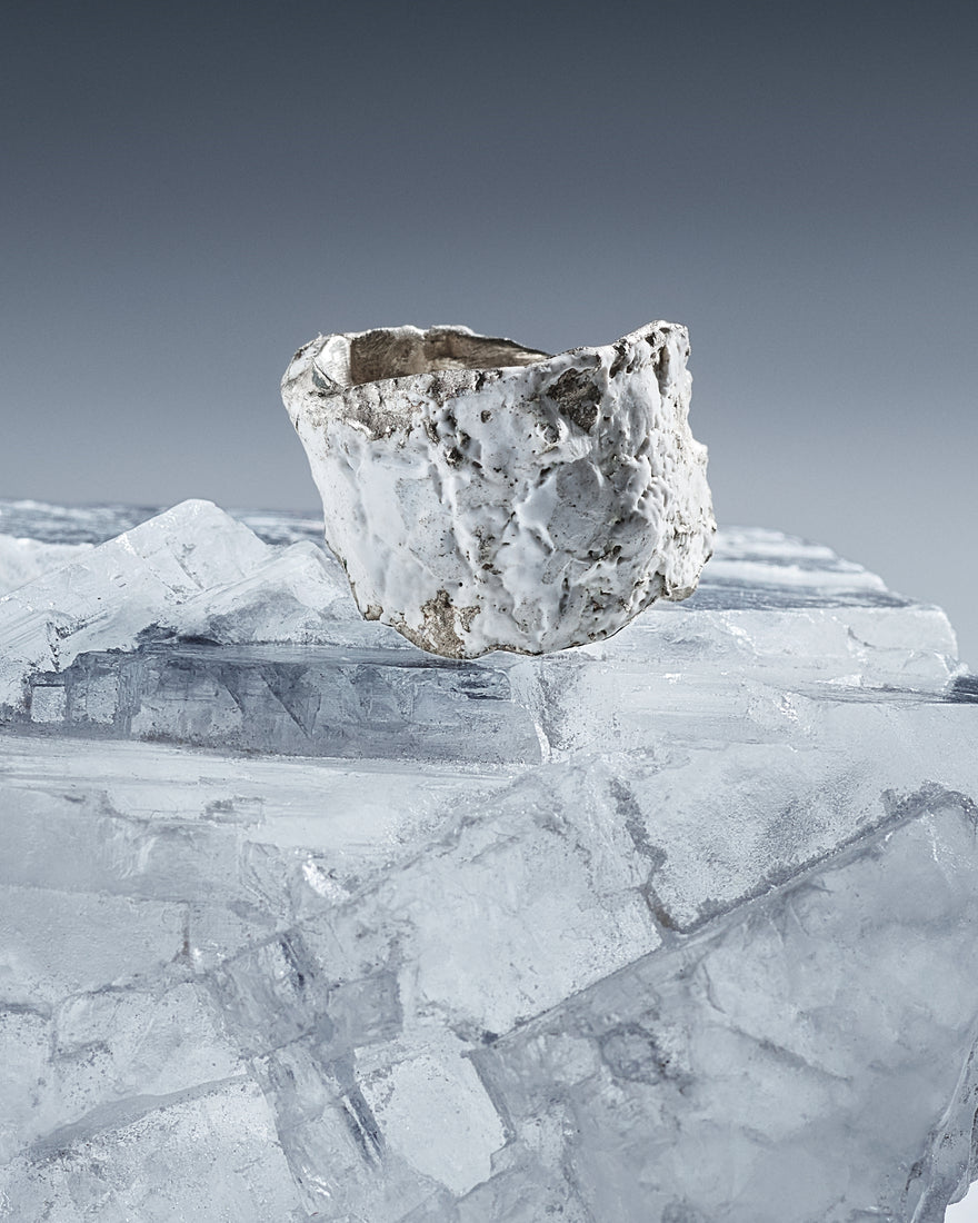 sculptural silver ring with white enamel coating