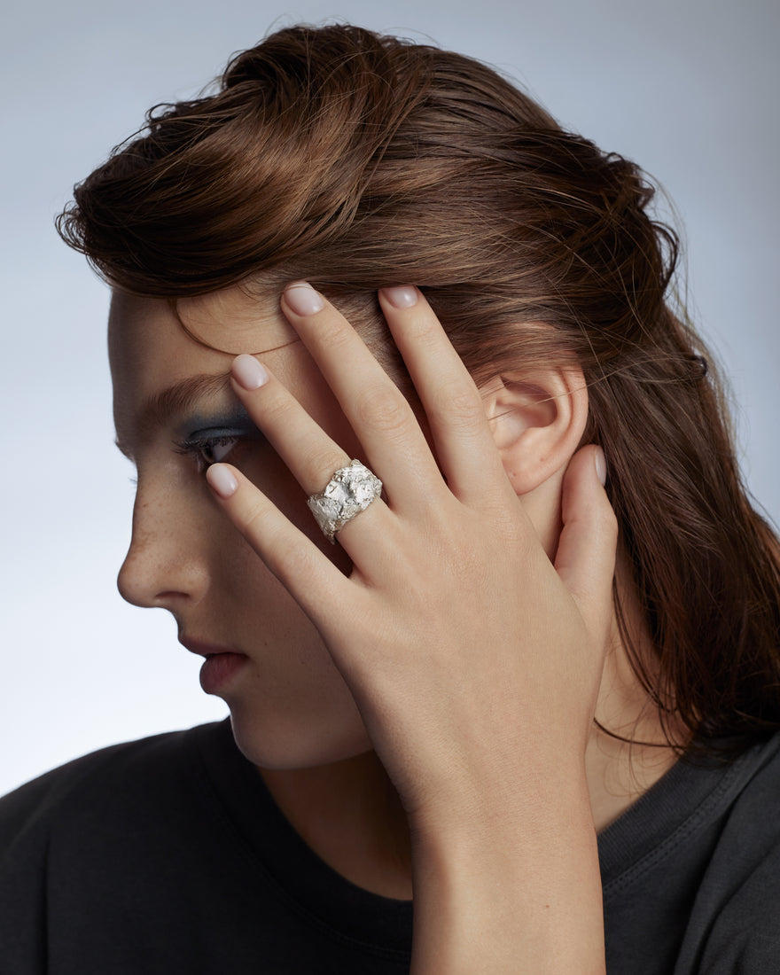 handcrafted sterling silver enamelled ring on woman's finger