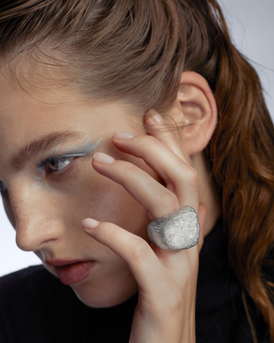 Handmade silver ring on hand